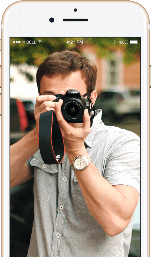 man taking a photo with a camera