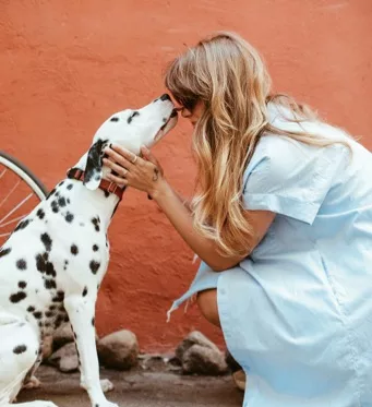 a woman with a dog