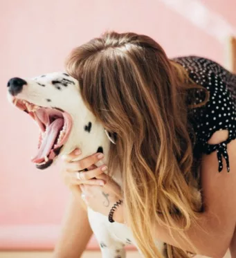 a woman with a dog